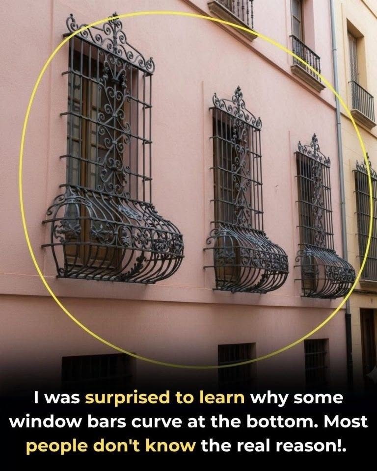 Why are some window bars curved at the bottom